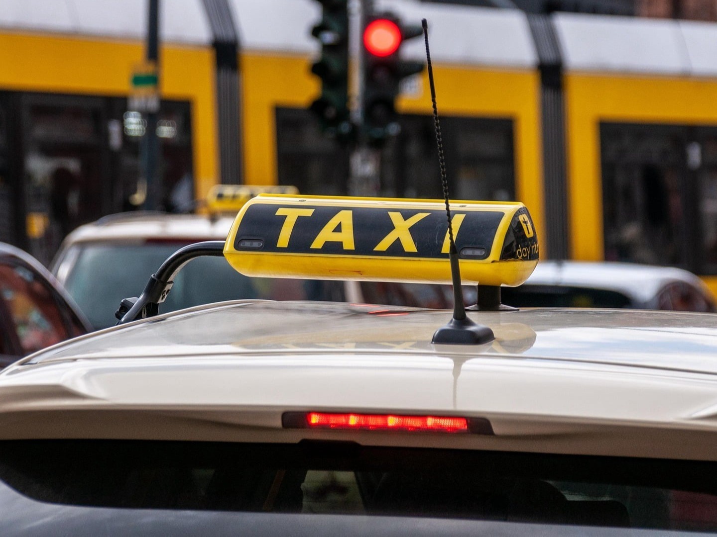 Redline Travel Barnsley 24/7 private hire taxi driving through Barnsley, South Yorkshire